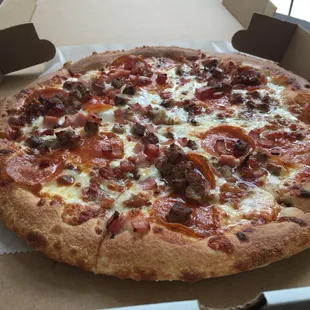 Medium meat lovers pizza for $9.99.... Pretty good pizza. It&apos;s cheap and fast!