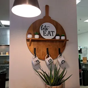 Four Sisters Cafe has F, S and C mugs as indoor decor