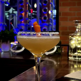 a cocktail in a coupe glass