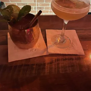 two cocktails on a table