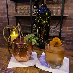 two cocktails on a table