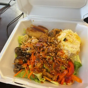 Bibimbap (Wednesday lunch special) for $10.38 Comes with drink and mini egg rolls - yum!