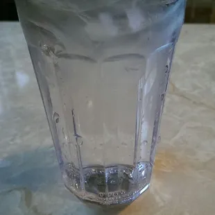 Plastic water glass.