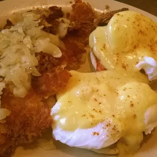 Eggs benedict and extra crisp hash browns with onion. Yum!!!