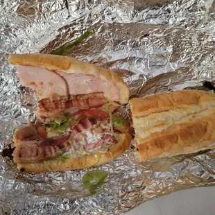 a sub sandwich on tin foil