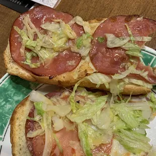 Sub, burnt bun, four slices of meat that you can see through and very little of anything else.