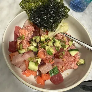sushi grade salmon , tuna and hamachi