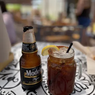 a cold beverage and a bottle of beer