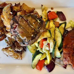 Special - filet over crispy fingerling potatoes, bacon and grilled veggies