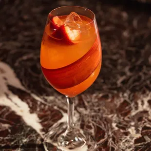 Aperol Spritz | Aperol, Prosecco, Strawberry,
Orange, Rhubarb, Soda