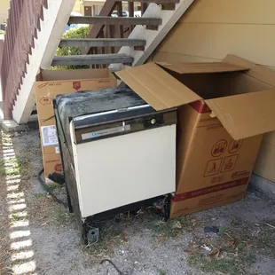 old dishwasher was left outside the downstairs apt. door and was left there for over a week.