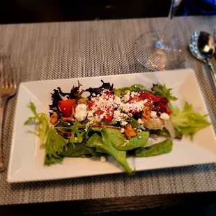 Mixed green salad with goat cheese and champagne vinaigrette