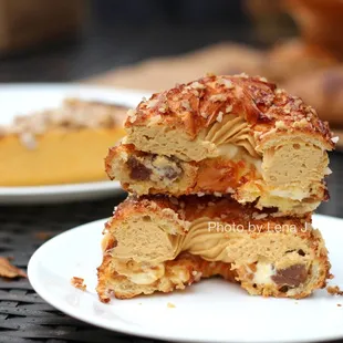 Inside of Paris Brest ($6.50) - Pâte à choux, caramel mousseline, diplomat cream, candied hazelnuts, gianduja chocolate, &amp; Meyer lemon jam