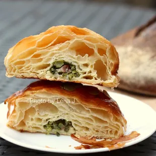 Inside of Seasonal Veggie Croissant ($4.50) - Lasoda potatoes, sumac, organic broccolini, goat cheese/pine nut filling, pumpkin seeds