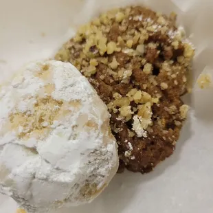 two pastries with powdered sugar
