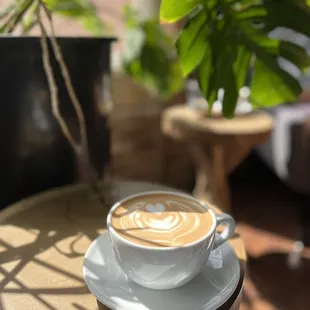 a cup of coffee on a saucer
