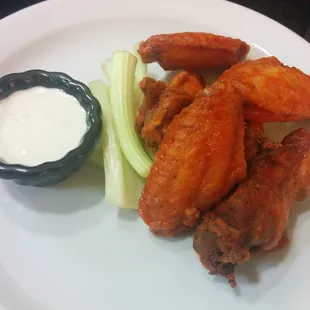 Buffalo wings, celery sticks &amp; blue cheese dip