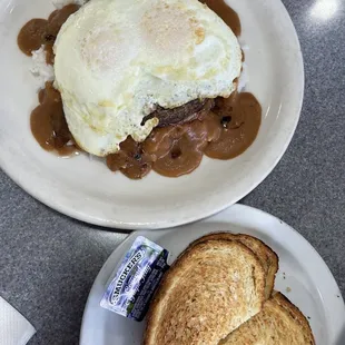 Loco Moco- 2 eggs over medium on a sirloin patty and rice and brown gravy