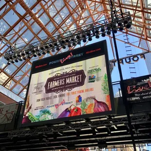 a sign for farmers market