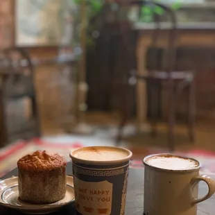 Coffee and blueberry muffin. The "paper cup" is actually ceramic!