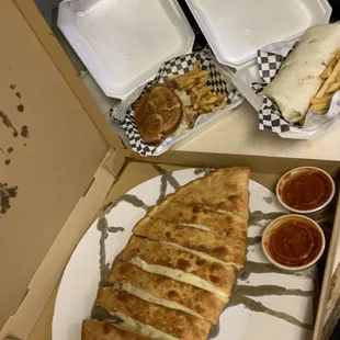Take out. Large Stromboli, Reuben and pub wrap both with seasoned fries. Yum!