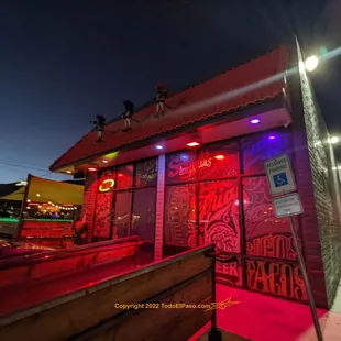 a restaurant with neon lights