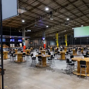 tables and chairs in a warehouse