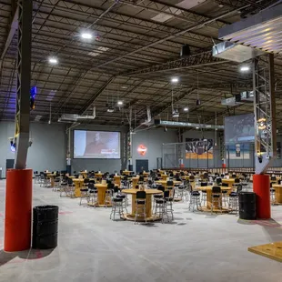 tables and chairs in a warehouse