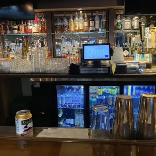 a bar with a lot of bottles