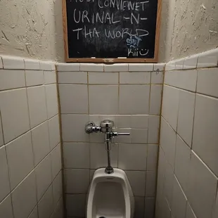 a urinal in a bathroom