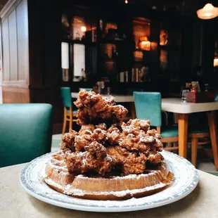 a plate of fried chicken and waffles