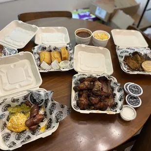 Fried ribs, sliced brisket, pull pork, smoke chicken, smoked sausage and pimento cheese, jalapeño cornbread.