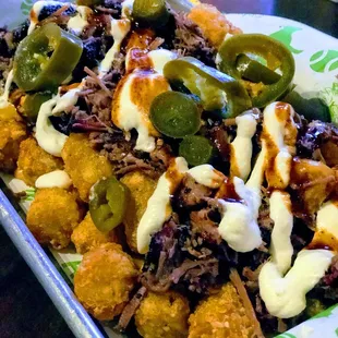 Brisket loaded tater tots. Yummy