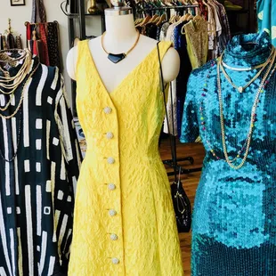 summer window display - featuring a gown from Memphis' own Frances Wright (now closed) - a gorgeous yellow brocade with rhinestone buttons.
