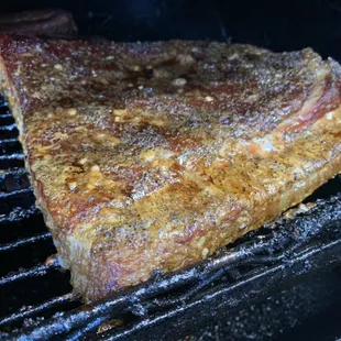 Homemade bacon on smoker