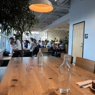 a restaurant with people sitting at tables