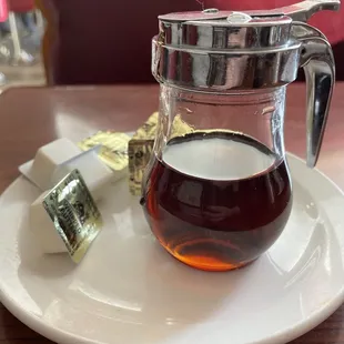 Classic syrup dispenser and plenty of butter!