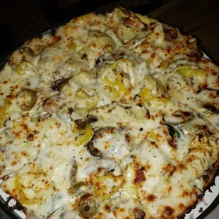 Cauliflower crust veggie pizza with alfredo sauce