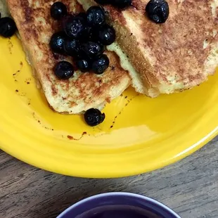 French toast with blueberries and a fruit cup