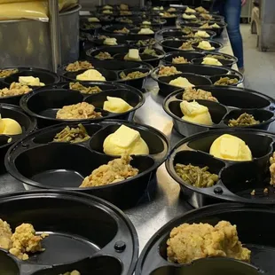 a large number of bowls of food