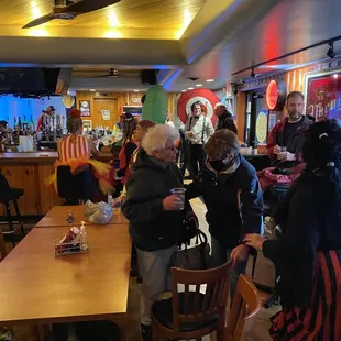 a group of people at a bar