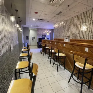 Very cool "bar" type seating area. Full compliment of outlets, great lighting, very modern and clean surfaces and furniture.