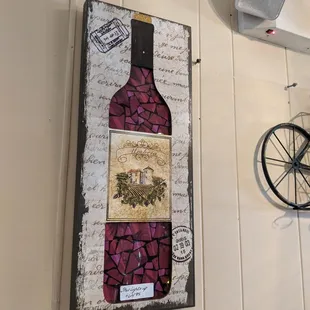 a wine bottle and a bicycle