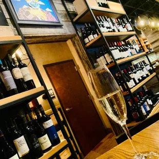 a glass of wine on a table