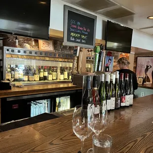 wine glasses on a bar