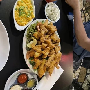 Seafood platter with coleslaw and Mac and cheese
