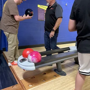 The owner has a passion for bowling and teaching.