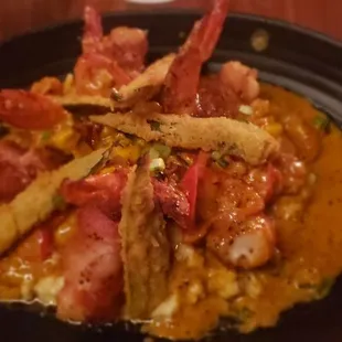 Bacon wrapped shrimp and grits
