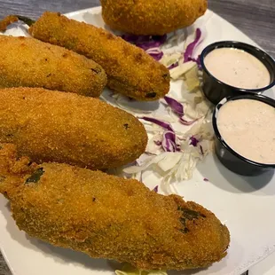 a plate of fried fish