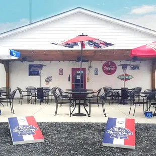 Check out the back patio! Live music on the weeks, beach volleyball, &amp; cornhole!